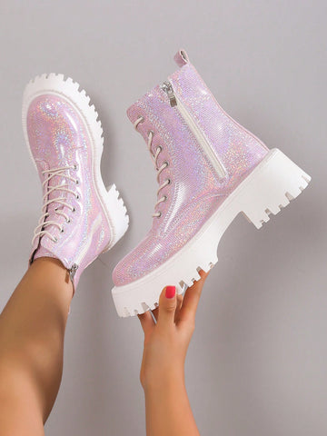 Step out in style and sparkle with these chic pink chunky heeled ankle boots, perfect for brightening up your fall and winter looks. The bold hue and sturdy heel bring playful confidence to every step, while the ankle height keeps you cozy and trendy. Pair them with your favorite cozy sweaters and skirts for a fun, flirty twist on cold-weather footwear.