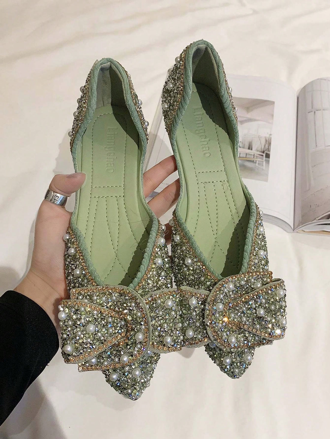 Step into spring with these chic slip-on flat shoes for women. These stylish shoes are designed with diamond accents for a touch of elegance. The perfect combination of fashion and comfort, they are a must-have for any wardrobe. Crafted with high-quality materials, these shoes will elevate any outfit.