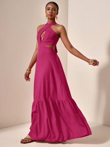 Unleash your playful side with this chic Spring/Summer Maxi Dress. Featuring a cross halter neck and backless design, this dress is perfect for a sunny day out. Made from a textured green fabric, it adds a unique touch to your wardrobe. Let your style bloom with this quirky dress!