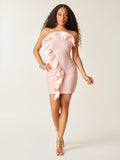 Bare your shoulders and embrace the season in this flirty strapless mini dress that's equal parts chic and carefree. The delicate ruffle detail adds a playful touch that catches every breeze and every eye. Whether you're heading to a summer soirée or casual weekend adventures, this dress delivers effortless style without the fuss. Slip it on, feel fabulous, and let the good times roll.