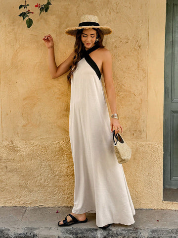 Upgrade your fashion game with our Chic Strapless Woven Dress in Black &amp; White. Featuring a sleek and elegant design, this dress is perfect for effortless elegance. Embrace your fashion-forward self and make a statement with this must-have addition to your wardrobe.