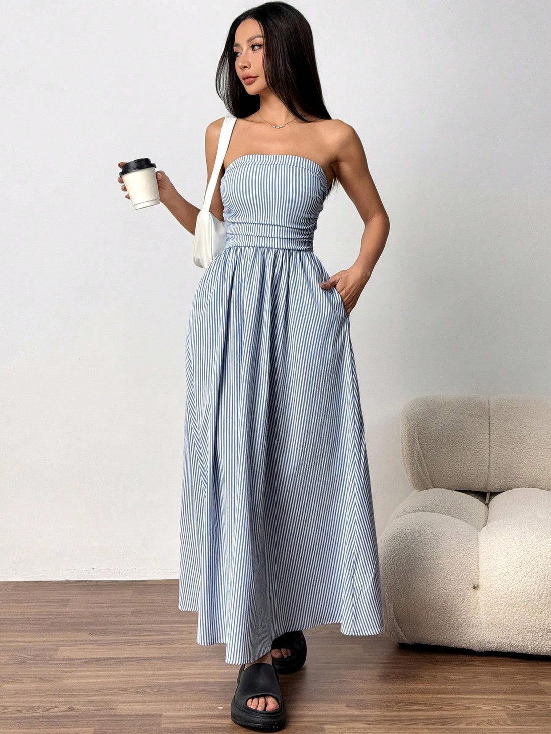 Get ready for a vacation in style with our Chic Striped Bandeau Dress! This dress is the perfect addition to your vacation wardrobe, with its pastel colors and trendy design. Keep it casual and chic with this must-have outfit!