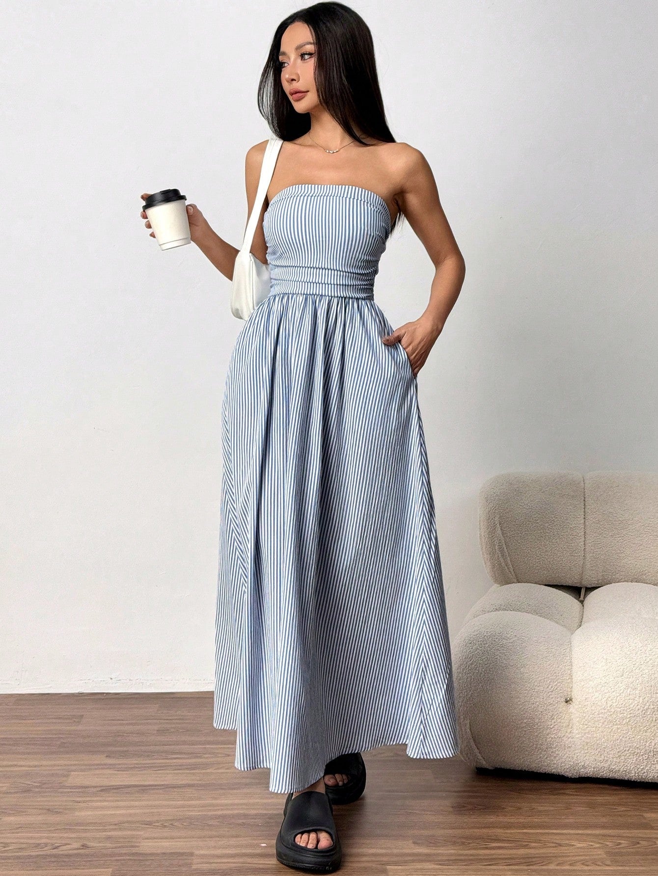 Get ready for a vacation in style with our Chic Striped Bandeau Dress! This dress is the perfect addition to your vacation wardrobe, with its pastel colors and trendy design. Keep it casual and chic with this must-have outfit!