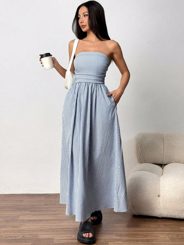 Get ready for a vacation in style with our Chic Striped Bandeau Dress! This dress is the perfect addition to your vacation wardrobe, with its pastel colors and trendy design. Keep it casual and chic with this must-have outfit!