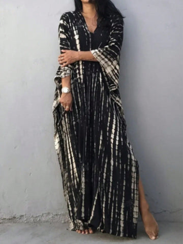 This elegant maxi dress features a chic striped design and batwing sleeves, perfect for a stylish yet comfortable look. The V-neck adds a touch of sophistication, making it the ideal cover-up for any occasion. Stay on-trend and effortlessly chic with this must-have outfit for women.