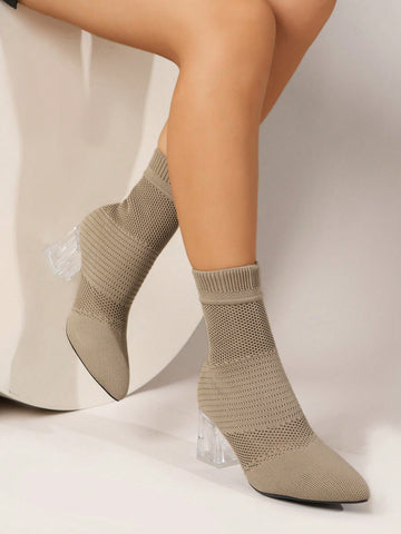 Elevate your Western cowgirl style with our chic striped elastic ankle boots. The elegant crystal heels add a touch of glamour to any outfit. The apricot color adds a unique twist to the classic design. Stand out from the crowd and step into these boots for a stylish and comfortable look.