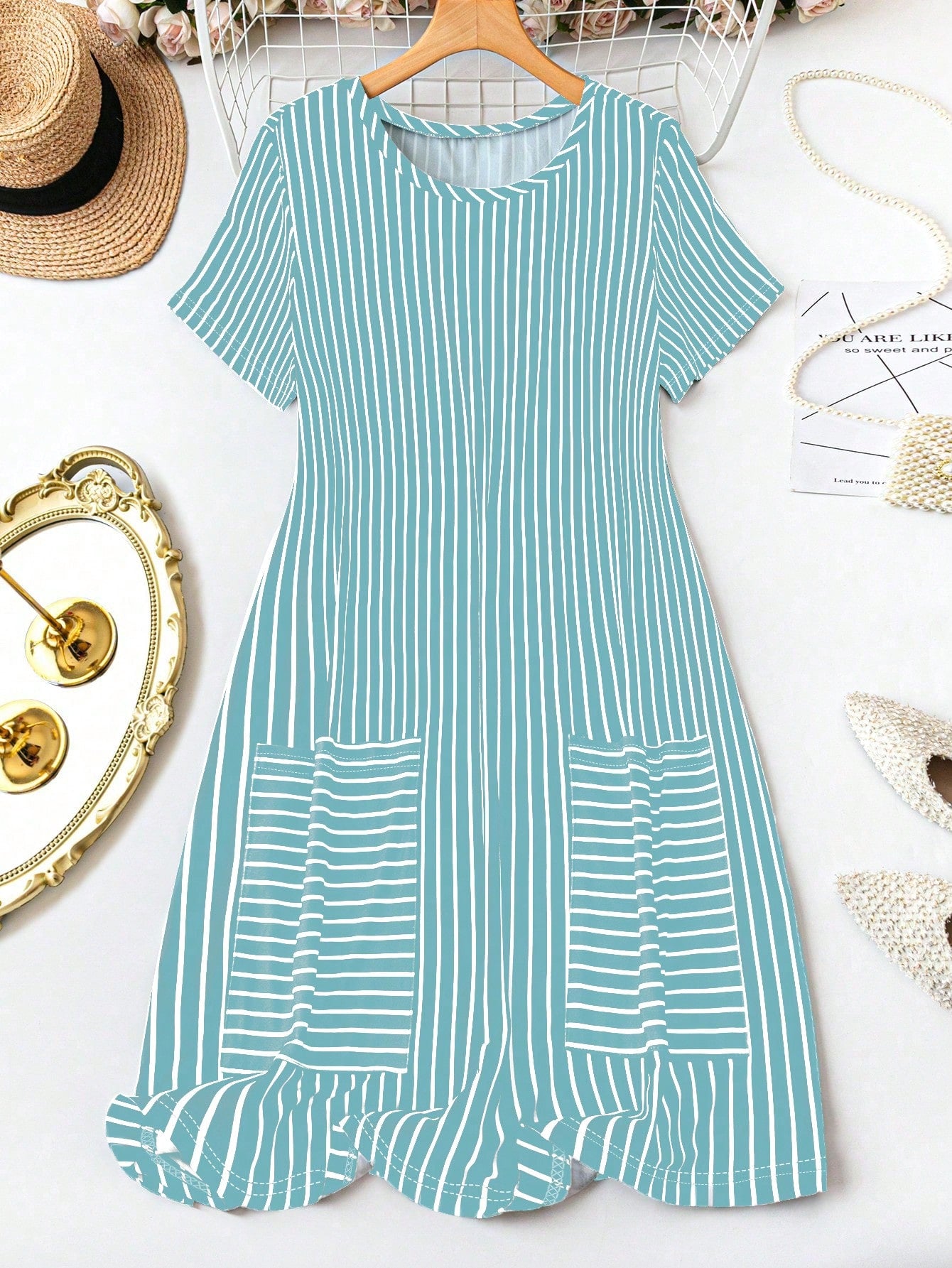 Stay chic and cozy this winter with our striped plus size casual dress! With double pockets for added convenience, this dress is perfect for any occasion. Stay warm and stylish with ease.