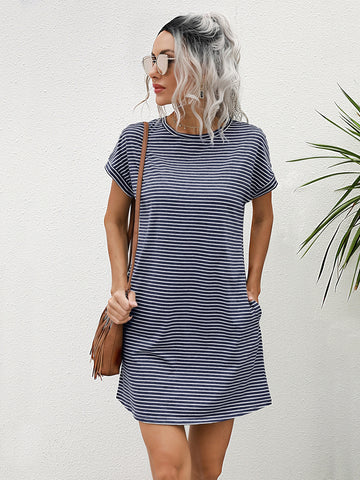 Effortlessly stylish and versatile, this Chic Striped Pocket Tee Dress is perfect for any occasion. With its chic striped design and pocket details, you'll stand out in style while staying comfortable. Perfect for dressing up or down, this dress is a must-have for every wardrobe.