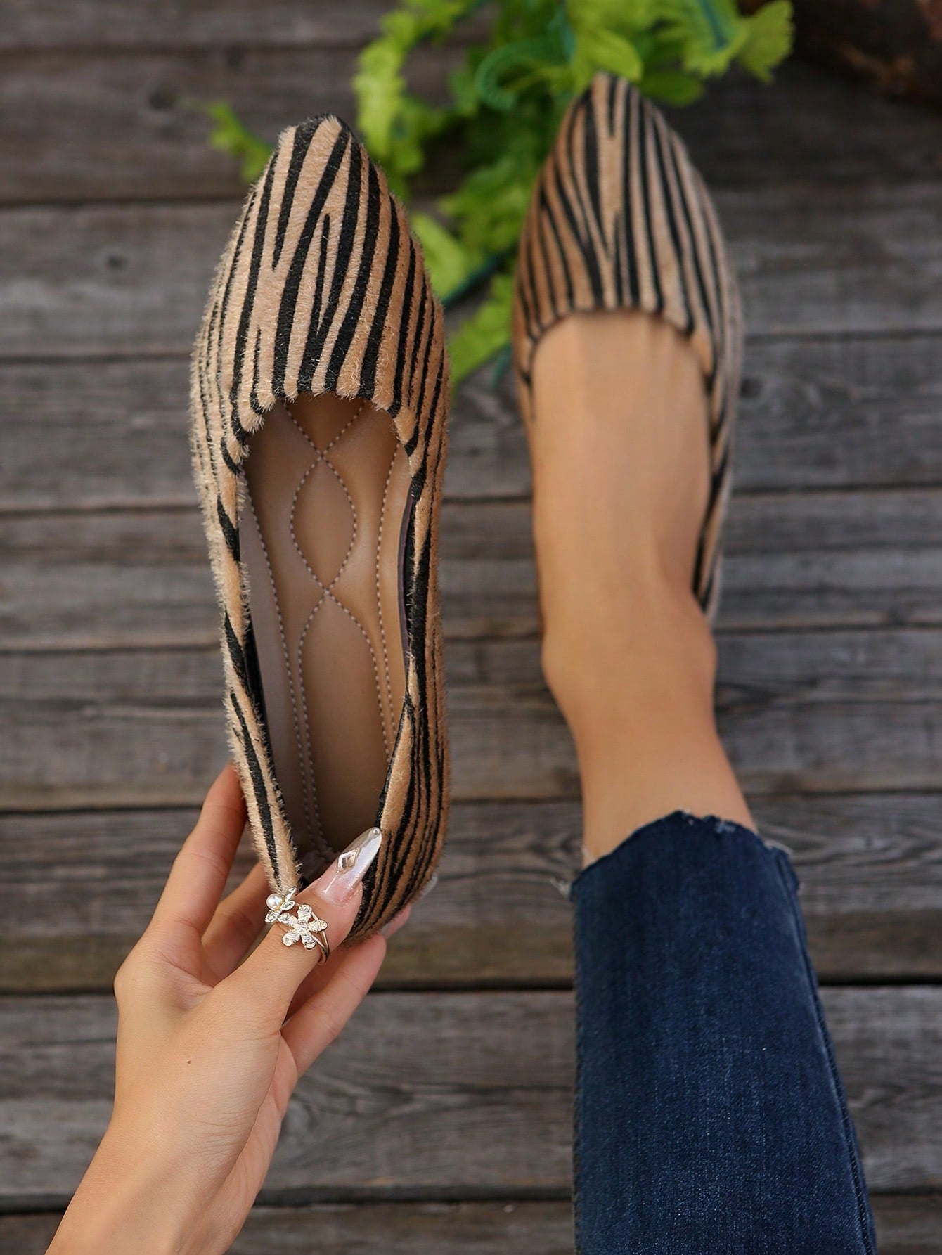 Elevate your style this Fall/Winter with our Chic Striped Pointed Toe Suede Slip-On Flats. Made with high-quality suede, these flats feature a stylish striped design and a pointed toe for a sophisticated touch. Slip-on and enjoy the comfort and fashion-forward look all season long.