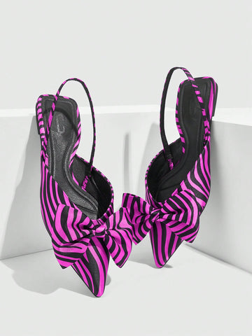 Experience the perfect blend of style and comfort with our Chic Striped Pointy Toe Bow Tie Flats. Designed for the fashion-forward and busy individuals, these flats effortlessly elevate any outfit for any occasion. The chic striped design and pointy toe add a touch of elegance, while the bow tie detail adds a feminine touch. Perfect for a day at work or a night out on the town, these flats are a versatile and stylish choice.