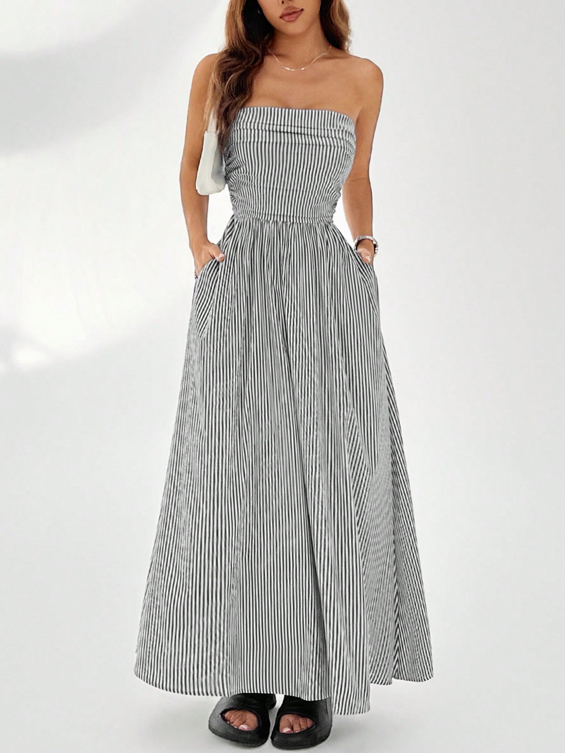 Effortlessly achieve stylish looks with our Chic Striped Slant Pocket Tube Longline Dress. Complete with slant pockets for added convenience, this dress is perfect for any occasion. Embrace chic and playful fashion with ease!