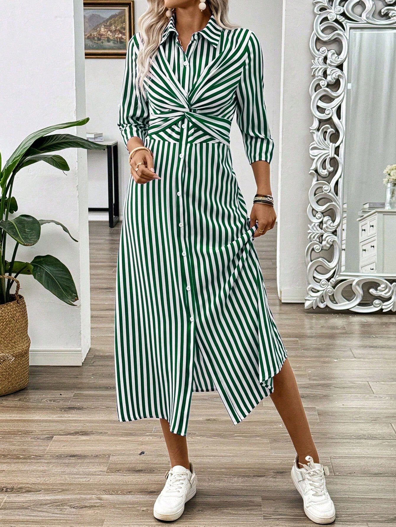 Get ready to turn heads in this chic summer maxi dress with a playful French twist front and buckle detail. With its trendy striped design, you'll be sure to stand out at any summer event. Perfect for any fashion-forward individual looking for a unique and stylish addition to their wardrobe!