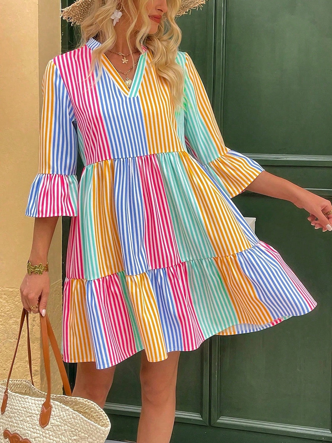 Get ready to turn heads this holiday season with our Chic Striped V-Neck Flare Sleeve Dress! Designed for effortless style, this dress features a flattering V-neck and flared sleeves. With its eye-catching striped pattern, you'll be the center of attention at any holiday gathering.