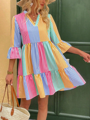 Get ready to turn heads this holiday season with our Chic Striped V-Neck Flare Sleeve Dress! Designed for effortless style, this dress features a flattering V-neck and flared sleeves. With its eye-catching striped pattern, you'll be the center of attention at any holiday gathering.