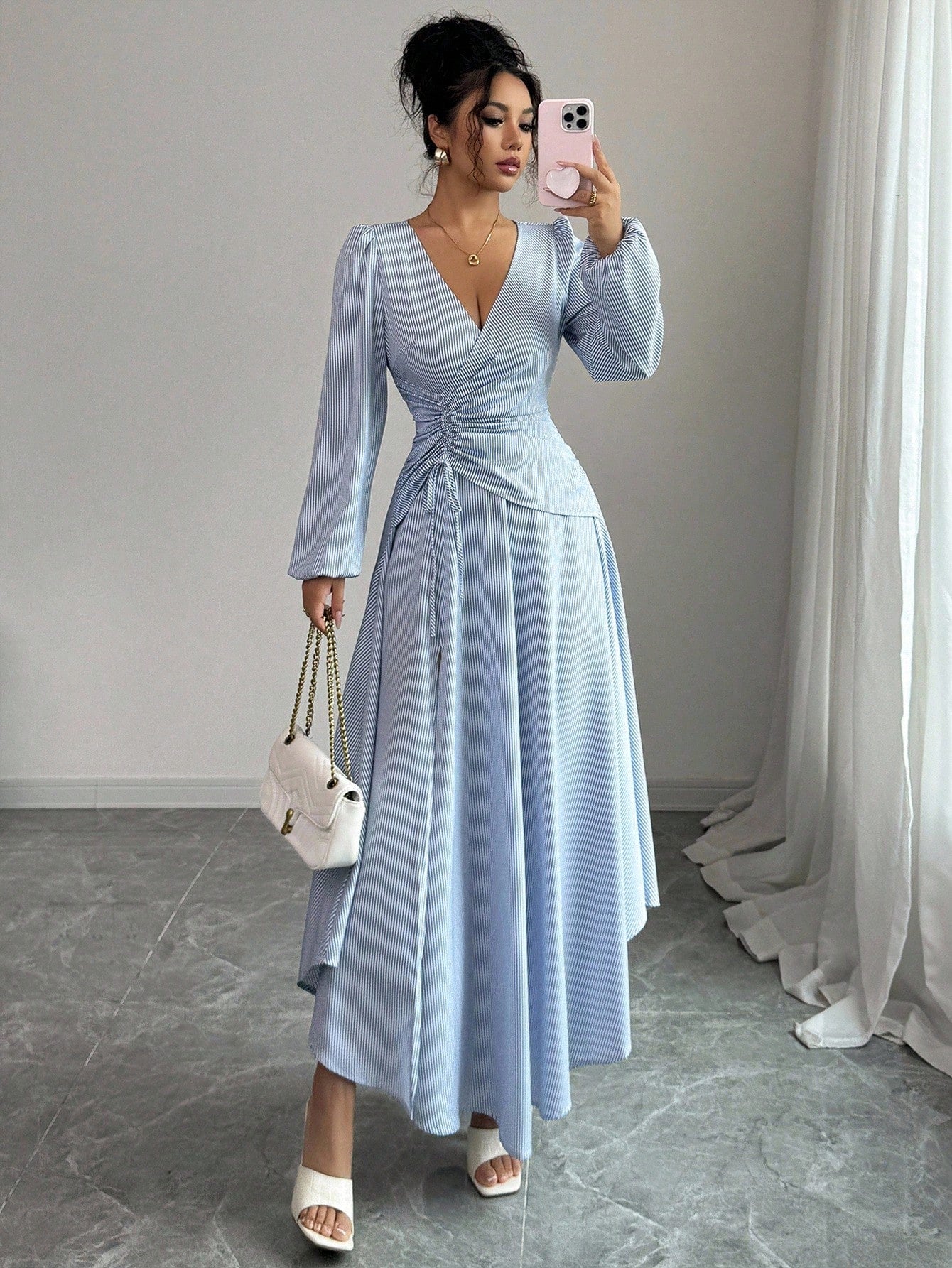 Turn heads with this playful chic striped dress featuring a ruched waist that flatters every curve and an asymmetric hem that adds a flirty twist. Perfect for effortless elegance, it blends bold stripes with a fun silhouette to keep you stylish and comfortable all day long. Whether you're out for brunch or a night on the town, this dress makes dressing up feel easy and exciting.