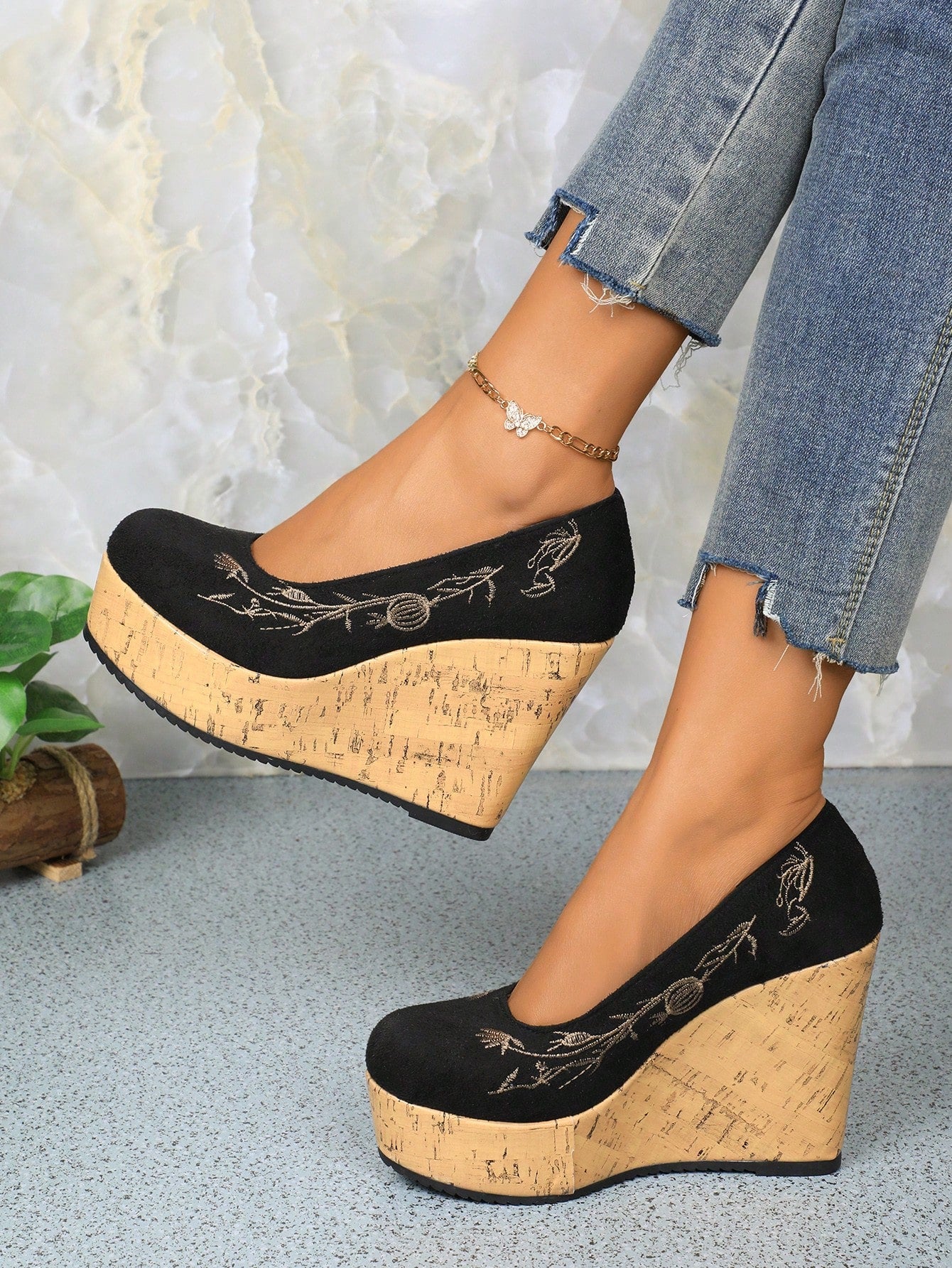 Unleash your inner fashionista with these Chic Suede Wedge Pumps! The one-strap design adds effortless style while the platform and wedge provide comfort and height. With a suede finish, you'll be the talk of the town. Walk confidently and comfortably in these stylish pumps.