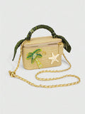 Natural straw tropical box crossbody bag with green wrapped handle and gold chain strap