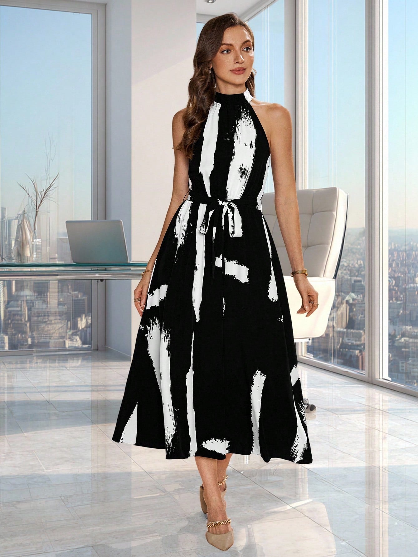 Turn heads this summer with the playful brush print belted halter dress. Its flattering halter neckline and cinched belt create a feminine silhouette, while the breezy fabric keeps you cool and comfortable. Perfect for sunny days and spontaneous adventures, this dress adds a splash of artistic charm to your warm-weather wardrobe. Embrace effortless style with a fun twist.