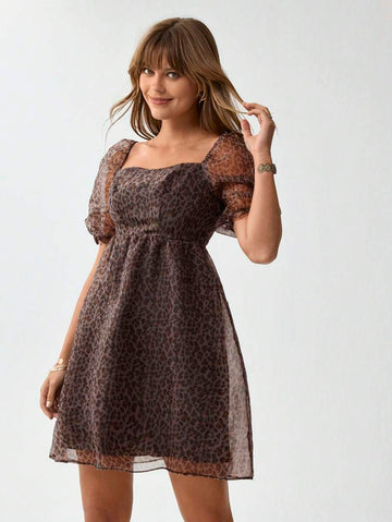 Step into summer with this playful leopard print mini dress featuring charming puff sleeves. Its lightweight fabric and flirty silhouette make it ideal for sunny days and western resort adventures. Effortlessly stylish, this dress adds a fun, bold touch to your warm-weather wardrobe.