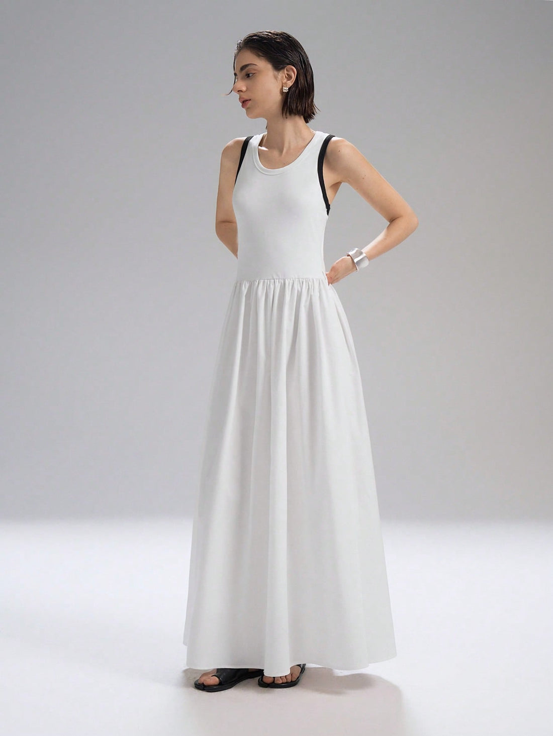 Step into summer with this chic long dress designed for effortless style and comfort. Featuring a playful colorblock trim and a breezy sleeveless cut, it’s perfect for casual outings or sunny days out. Lightweight and flattering, this dress keeps you cool while turning heads wherever you go. Embrace the season with a splash of color and a carefree vibe!