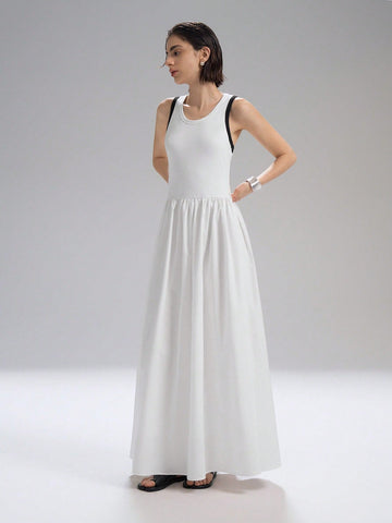 Step into summer with this chic long dress designed for effortless style and comfort. Featuring a playful colorblock trim and a breezy sleeveless cut, it’s perfect for casual outings or sunny days out. Lightweight and flattering, this dress keeps you cool while turning heads wherever you go. Embrace the season with a splash of color and a carefree vibe!