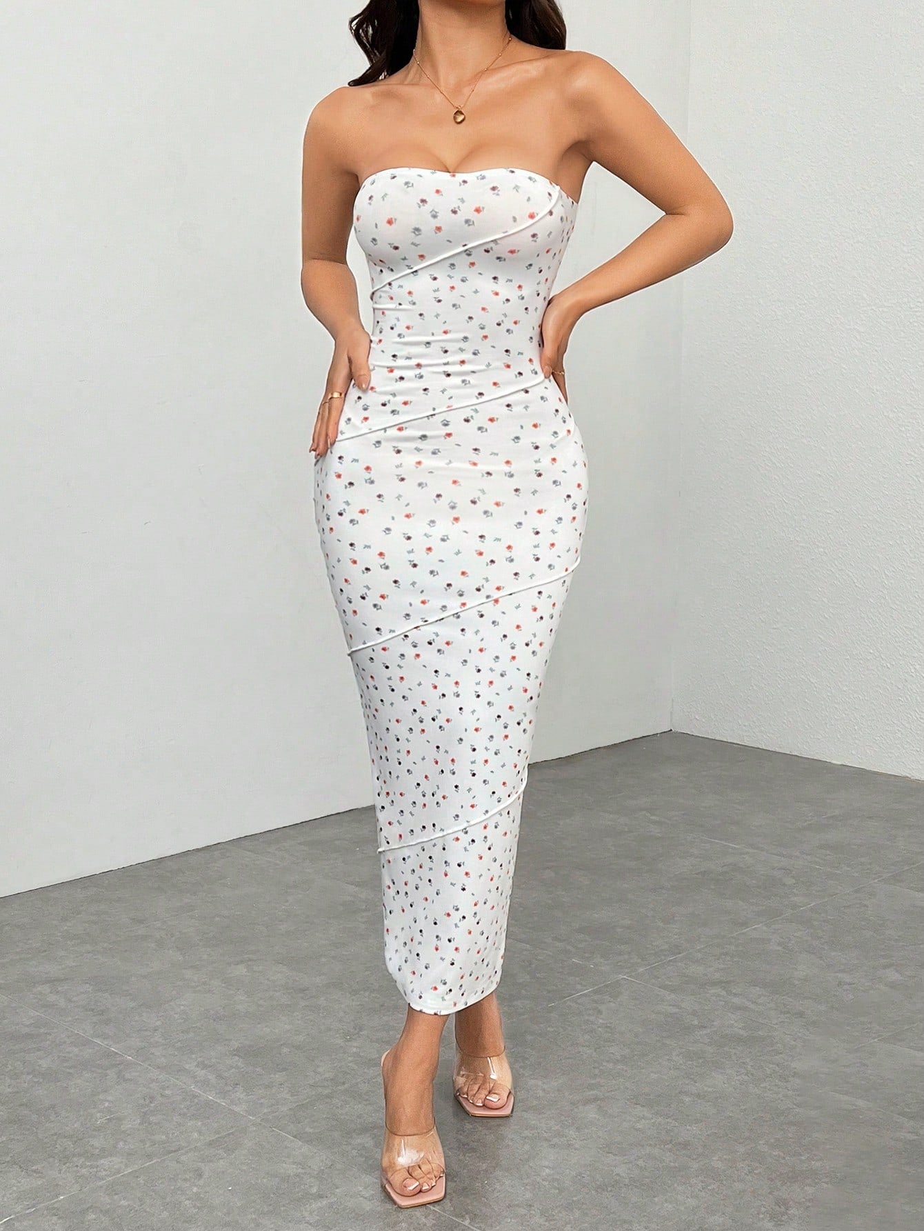 Dress to impress this summer with our Chic Summer Petal Mini Dress! This trendy pink floral tube top will make you stand out at any event, while keeping you cool and comfortable. Perfect for a fun and playful look. (Don't forget your shades!)