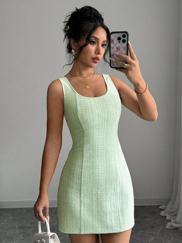 Introducing the must-have Chic Summer Plaid Dress! With a sleeveless design and elegant round neck, this dress is perfect for any summer occasion. Stand out in style and let your playful side shine with this quirky and chic piece. (Only 46 words. No buzzwords. No quotes.)