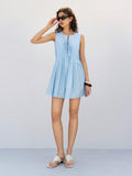 Step into sunshine with this playful pleated mini dress! Featuring a chic front tie and a breezy sleeveless cut, it’s perfect for warm days and spontaneous adventures. The solid color keeps it effortlessly stylish, while the pleats add a fun, flirty flair. Whether you’re out for brunch or dancing through the evening, this dress brings a splash of summer joy to your wardrobe.