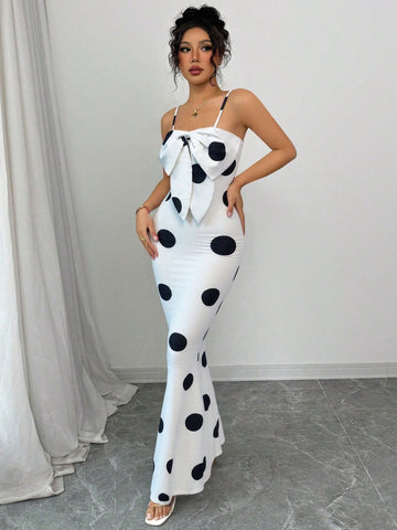 Step into sunny days with this playful summer dress featuring classic polka dots and flirty spaghetti straps. The charming bowknot detail adds a sweet touch, making it perfect for casual outings or garden parties. Lightweight and breezy, it keeps you cool while turning heads wherever you go.