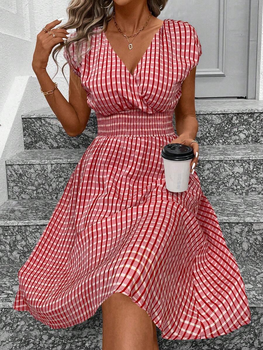 Step into summer with this playful and breezy dress! Featuring a flattering surplice neckline and stylish batwing sleeves, it’s designed to keep you cool and comfy on casual vacations. The vibrant print adds a fun pop of color, making this dress your go-to for effortless, chic days under the sun.