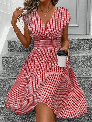 Step into summer with this playful and breezy dress! Featuring a flattering surplice neckline and stylish batwing sleeves, it’s designed to keep you cool and comfy on casual vacations. The vibrant print adds a fun pop of color, making this dress your go-to for effortless, chic days under the sun.