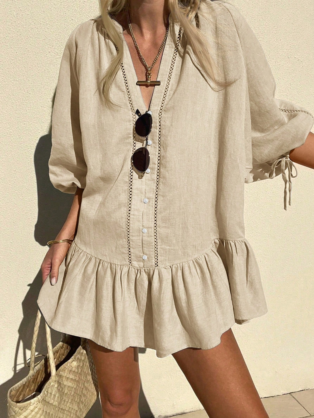 Effortlessly elevate your summer style with our Chic Ruffle Hem Linen Dress. Made with high-quality linen, this dress offers both comfort and elegance. The ruffle hem adds a touch of femininity, making it perfect for any occasion. Experience effortless elegance for the modern woman.