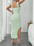 Get ready to turn heads in this playful and chic summer dress! With ruffled mesh detailing and a daring slit hem, this bodycon dress will hug your curves in all the right places. And who doesn't love suspenders for a touch of quirkiness? Stand out in style and make a statement with this unique and flirty dress.