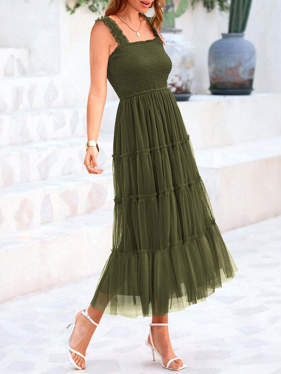 Dress to impress in this Chic Summer Sleeveless Mesh Midi Dress featuring a playful ruffled tulle skirt for an effortless elegant look. Perfect for any occasion, its lightweight design and breathable fabric ensure you'll be comfortable and stylish. Shine like the fashionista you are in this chic and quirky dress!