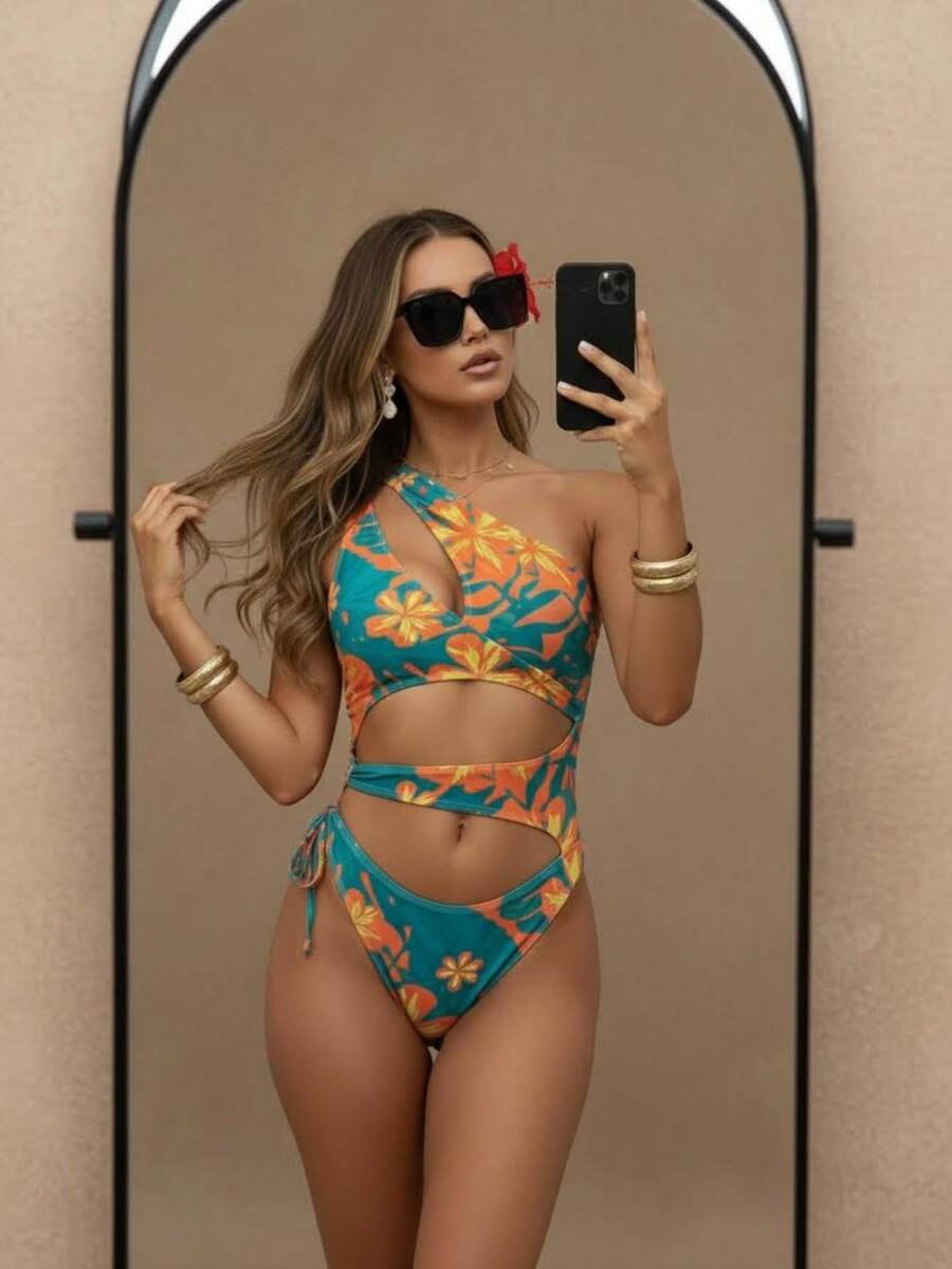 Make a statement this summer with our chic one-piece swimsuit, featuring a bold hollow one-shoulder design that combines elegance with modern flair. Crafted in a timeless solid color, this versatile piece transitions seamlessly from beach days to poolside lounging. The asymmetrical neckline adds sophistication while the flattering silhouette ensures comfort and confidence. Perfect for vacation getaways or everyday summer wear, this swimsuit delivers style without compromise.