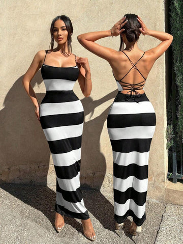 Turn heads this season in our effortlessly chic striped maxi dress—the perfect companion for sun-soaked getaways and breezy adventures. The flattering halter neckline frames your shoulders beautifully, while the crisscross back design adds an unexpected twist of elegance. Lightweight and flowing, this dress transitions seamlessly from beachside strolls to casual dinners. Whether you're lounging poolside or exploring a new destination, this striped stunner keeps you looking cool, comfortable, and undeniably 