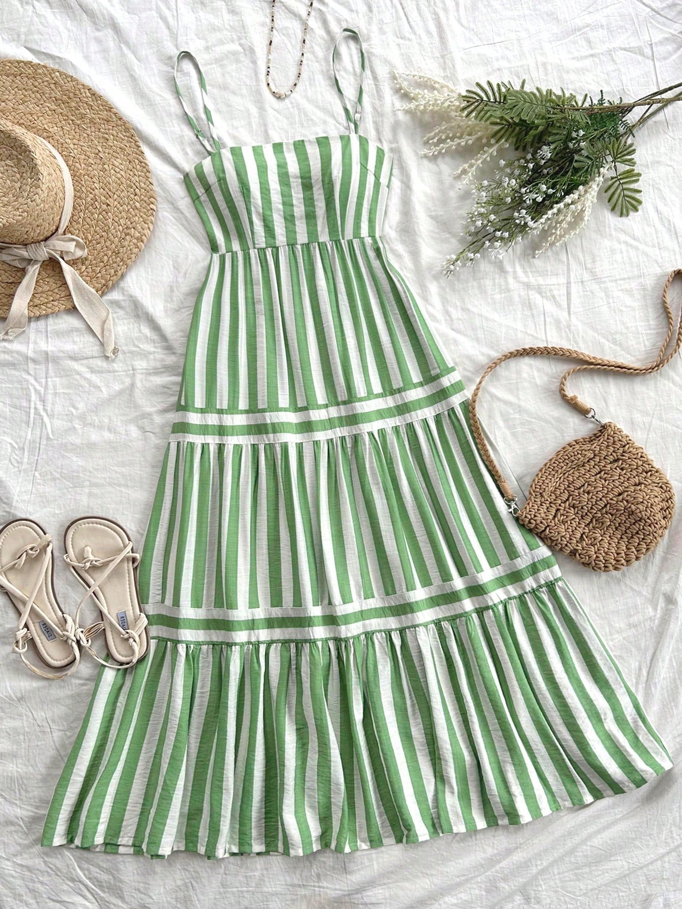 Revamp your summer wardrobe with our Chic Summer Stripes dress by Dreamara! This A-Line dress in green and white is perfect for any casual outing. Its chic stripes add a touch of playfulness to your overall look, while the comfortable A-Line design keeps you cool and stylish all day long. Say goodbye to boring summer outfits and spice up your fashion game with Dreamara!