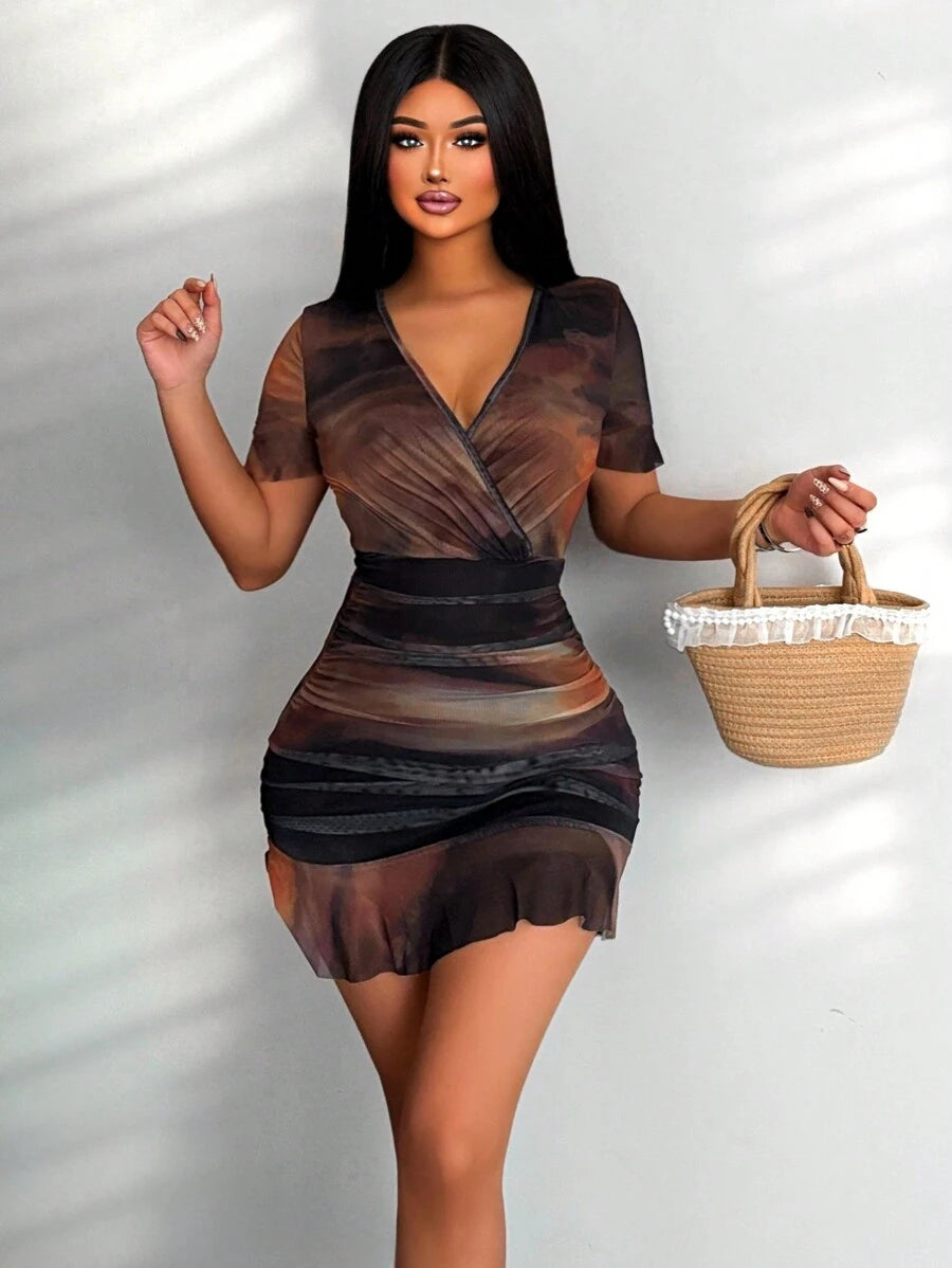 Turn heads this season in our vibrant tie-dye bodycon dress—the perfect blend of fun and flirty style. The flattering overlapping V-neck creates an elegant neckline while the fitted silhouette hugs your curves in all the right ways. Finished with a playful ruffled hem that adds movement and personality, this dress transitions effortlessly from beach days to evening outings. Whether you're soaking up the sun or dancing under the stars, this colorful statement piece keeps you looking fresh and fabulous all su