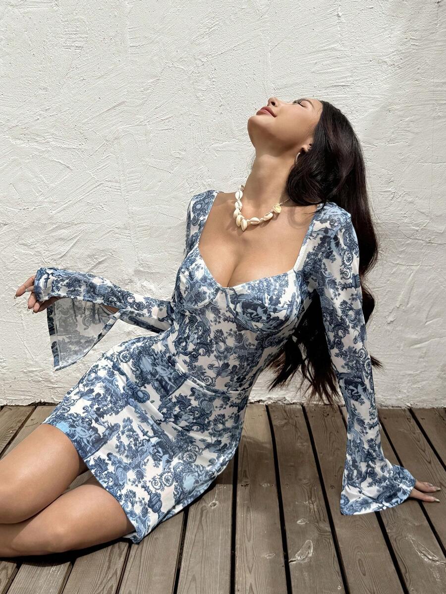 Get your heart racing with this chic V-neck mini dress! Featuring an elegant allover heart print, this dress is perfect for summer. Whether you're going on a date or hitting up a music festival, this dress is sure to turn heads and make you stand out. Love at first wear!