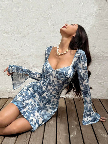 Get your heart racing with this chic V-neck mini dress! Featuring an elegant allover heart print, this dress is perfect for summer. Whether you're going on a date or hitting up a music festival, this dress is sure to turn heads and make you stand out. Love at first wear!