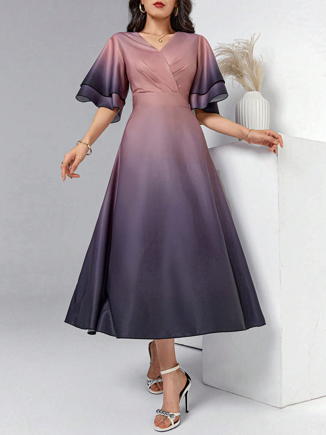 Look effortlessly stylish with our Chic Summer Vibes dress. The elegant ombre design and v-neckline flatters your figure while the ruffle hem adds a touch of femininity. Perfect for any summer occasion, this dress will keep you cool and fashionable all day long.