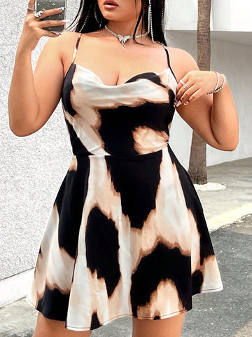 Enhance your summer wardrobe with Chic Summer Vibes: Plus Size Tie-Dye Backless Cami Dress. The chic tie-dye design and backless style exude effortless style, perfect for any summer occasion. Plus, the comfortable fit in a range of sizes ensures you'll feel confident and chic at the same time. Elevate your summer vibes today.