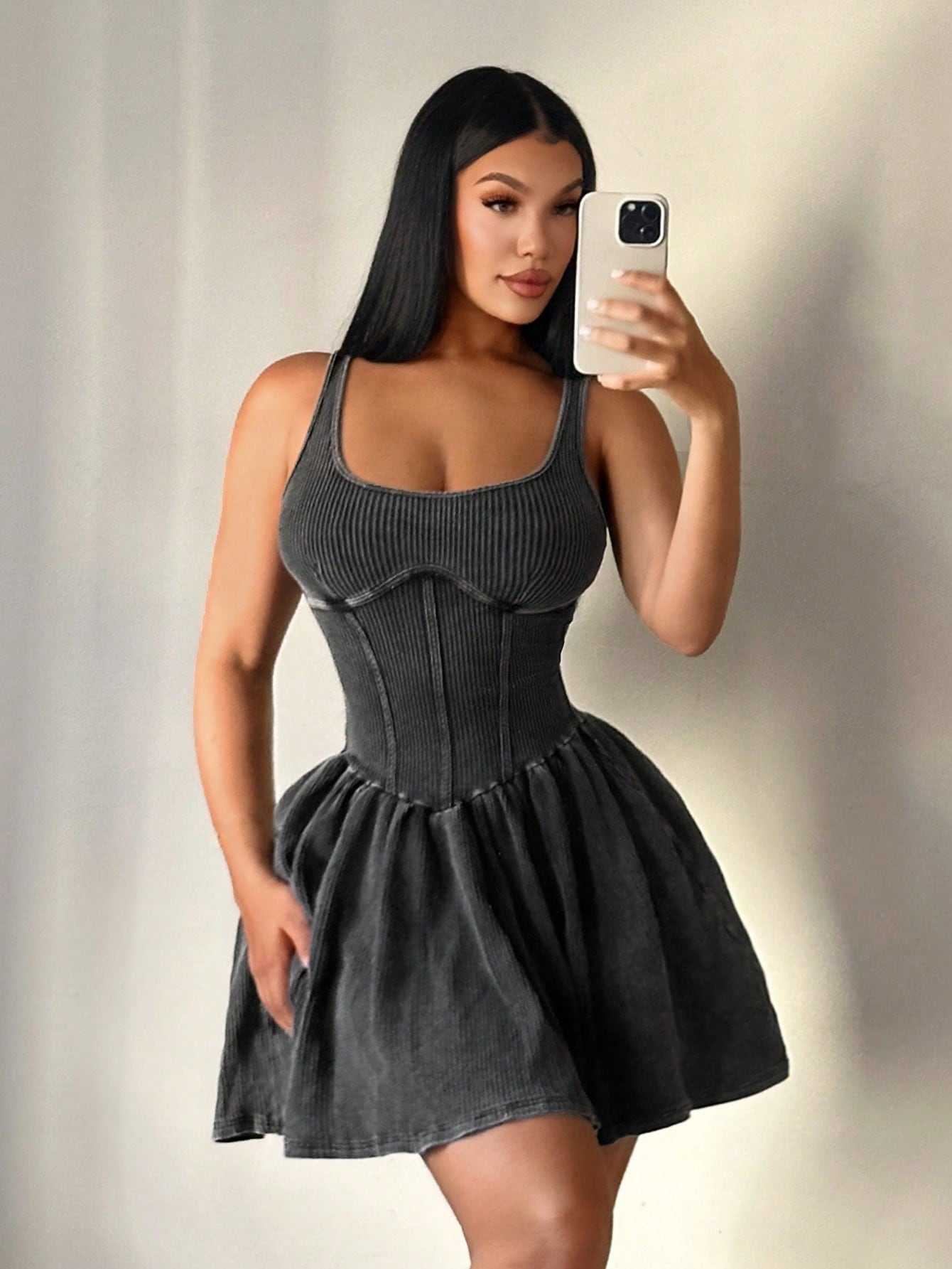 Embrace sunny days with this playful sleeveless mini dress that’s all about effortless style and comfort. The washed fabric gives a cool, lived-in look while the waist cinch adds just the right touch of shape for a flirty silhouette. Perfect for beach trips, brunch dates, or chasing summer adventures in style.