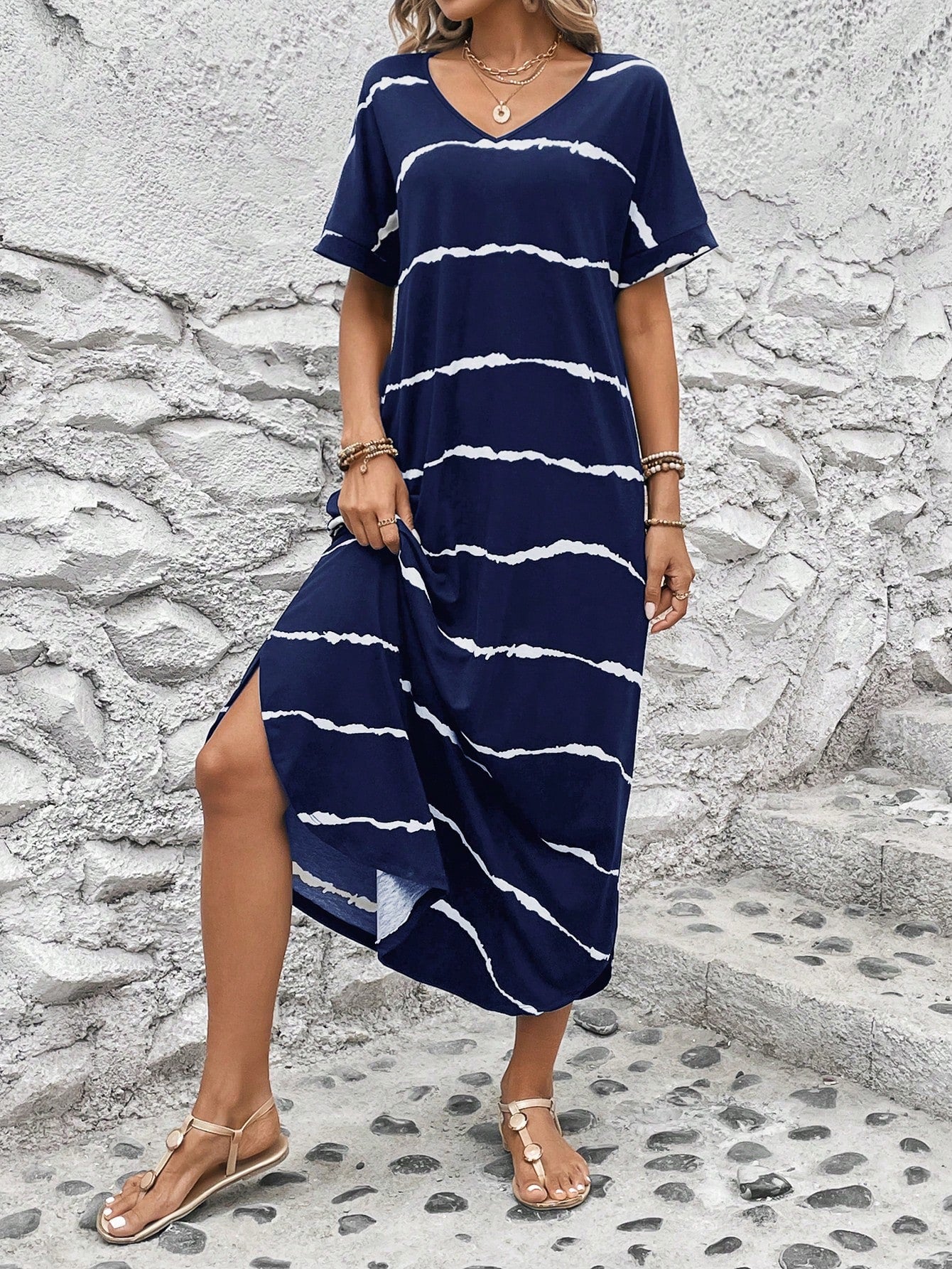 Unleash your inner fashionista with this chic tie-dye batwing tee dress, complete with a hidden pocket and curved hem. Keep your essentials close while looking effortlessly stylish. Perfect for any occasion (or perfect excuse to wear pajamas in public...)