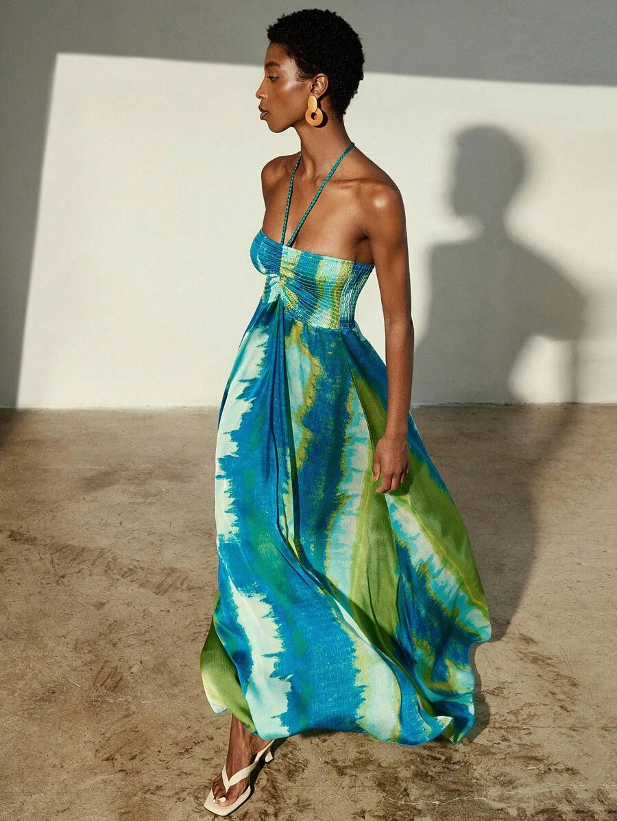 Exude Ethereal Sophistication in Our Chic Tie-Dye Chiffon Halter Neck Dress!

Experience the breathtaking fusion of nostalgic artisanal heritage and sharp, modern fluid tailoring. This stunning tie-dye halter dress is meticulously designed for the woman who values a high-fashion, "quiet luxury" approach to resort wear—the ultimate centerpiece for prestigious beachside dinners, exclusive island retreats, and high-authority summer social gatherings.

Iconic Tie-Dye Artistry: Featuring a masterfully curated, s