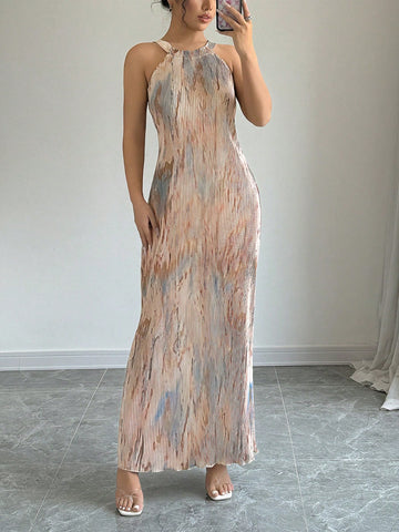 Introducing our Chic Tie-Dye Maxi Dress, featuring an elegant pleated design for effortless style. Stand out in this playful and fun dress, sure to make a statement and turn heads. Perfect for any occasion, this dress offers both style and comfort for the fashion-forward individual. Get yours now!