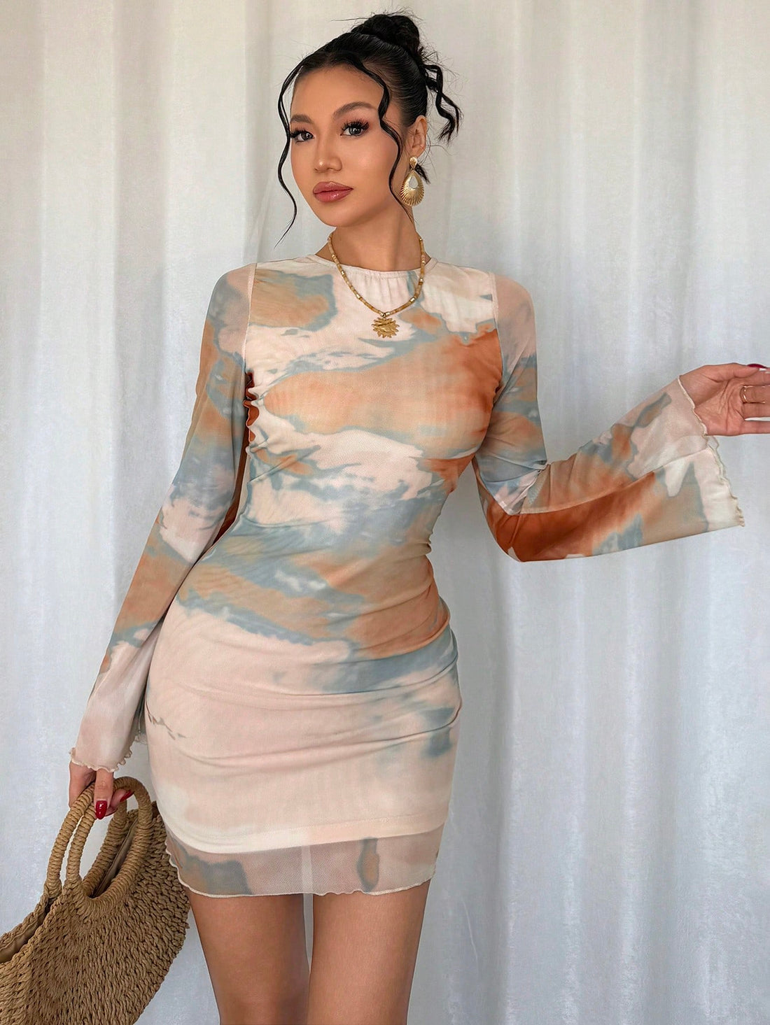 Get ready to turn heads with our Chic Tie-Dye Print Backless Mesh Dress! This flirty dress boasts a trendy tie-dye print and a seductive backless design. Perfect for a night out, this dress will make you feel confident and stylish. Don't be afraid to show off your playful side with this must-have dress!