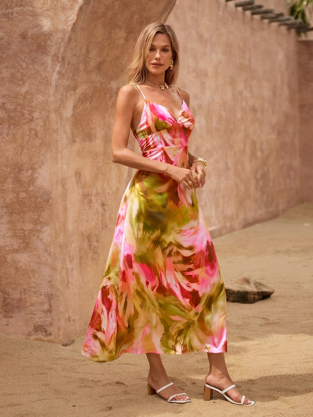 Step into sunshine with this playful tie-dye A-line dress, featuring delicate spaghetti straps for a breezy, carefree feel. Perfect for beach days, lively parties, or casual outings, its vibrant colors add a splash of fun to any occasion. Flattering and easy to wear, this dress keeps your style light and lively wherever you go.