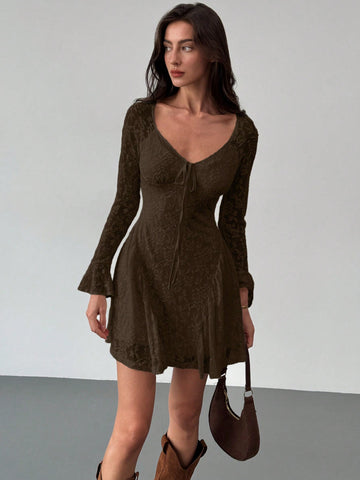 Elevate your style with our Chic Tie-Front Flared Sleeve Bodycon A-Line Dress! Made with textured fabric, this dress boasts a flattering A-line silhouette and trendy tie-front detail. The flared sleeves add a touch of femininity and movement. Perfect for any occasion, this dress will make you feel confident and stylish.