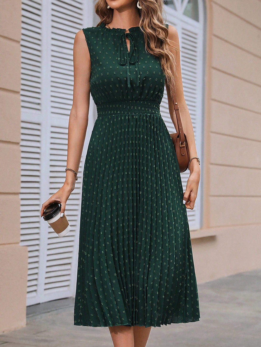 Effortlessly achieve elegance in this Chic Tie-Neck Pleated Maxi Dress. The tie-neck adds a touch of sophistication, while the pleats provide a flattering silhouette. Perfect for any occasion, this dress will have you looking chic and poised (with minimal effort).